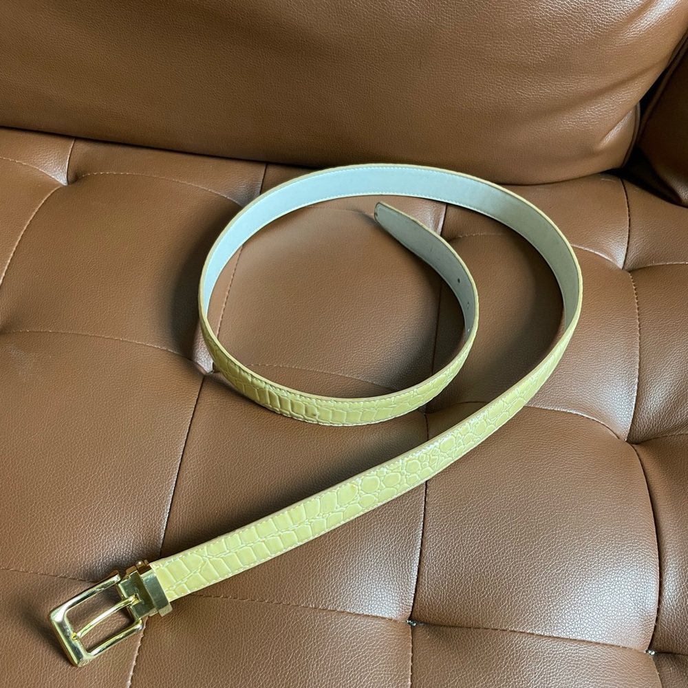 Genuine yellow leather snakeskin belt with gold buckle.